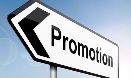 Road sign pointing to exit with promotion written on it